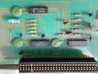 Cheetah's minimalist but sonically-convincing £29.95 SpecDrum uncovered: Ferranti DAC, op-amp, TTL glue and analogue filters. This let the 3.5 MHz Sinclair Spectrum's Z80A processor play AM-radio quality 20 KHz audio, packing 8 percussion samples into 20K of RAM (photo by SNG, overmatter from the book)